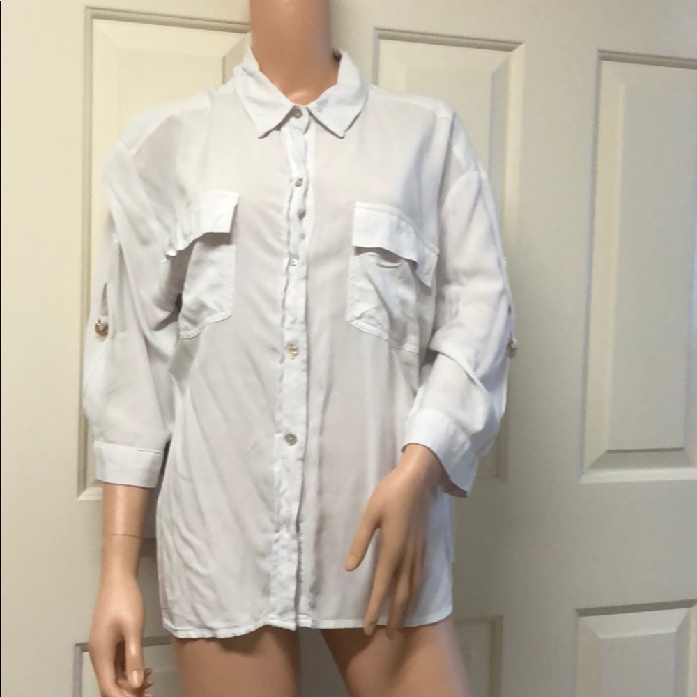 A New Day. Woman’s White Top.